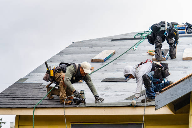 Professional Gutter Installation technician working in Lawn, PA